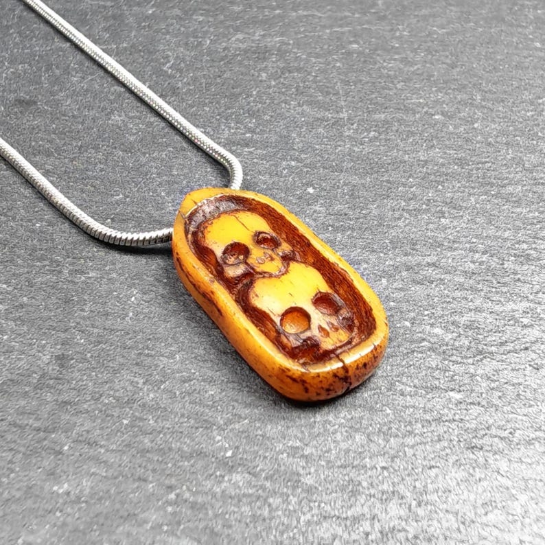 Authentic Yak Bone Carved Dual Skeleton Skull Pendant 30mm × 14mm