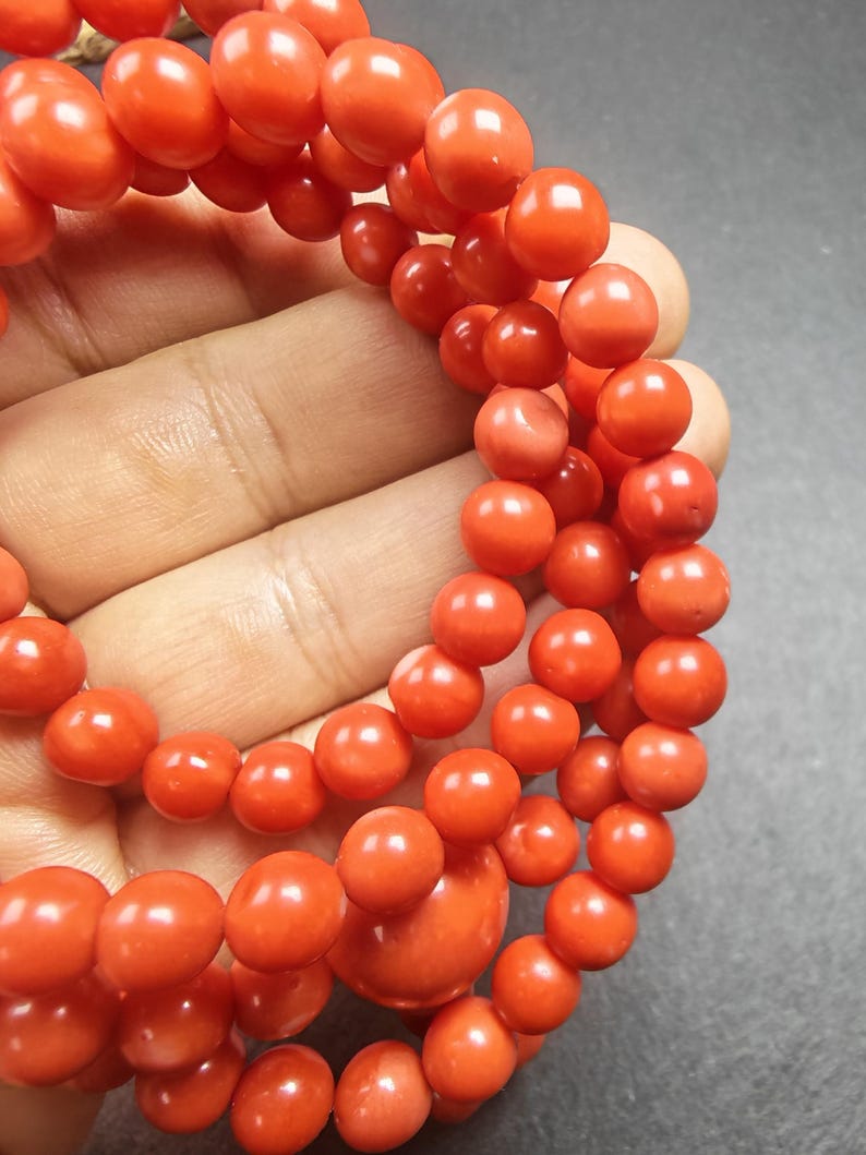 8mm Red Bamboo Coral Necklace Mala - 41cm stretched - Tibetan Buddhist mala beads, close-up detail