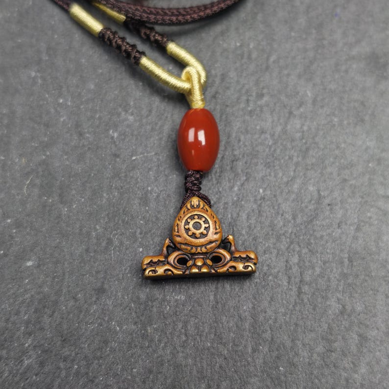 Deer & Dharma Wheel Pendant - 20mm - Tibetan Buddhist amulet, close-up detail