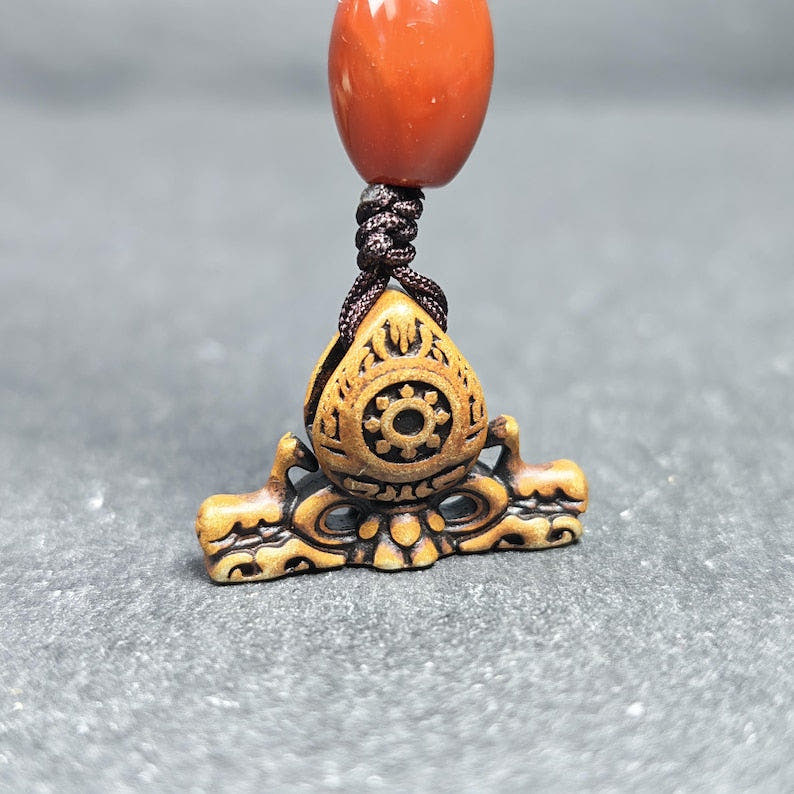 Deer & Dharma Wheel Pendant - 20mm - Tibetan Buddhist amulet, front view