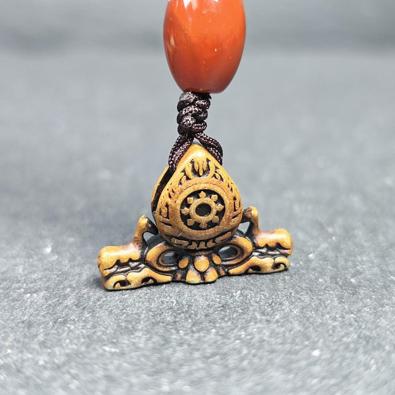 Deer & Dharma Wheel Pendant - 20mm - Tibetan Buddhist amulet, front view