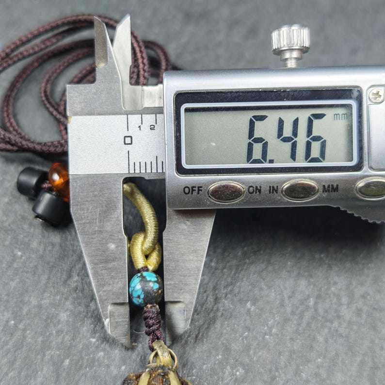 Vajra Amulet Tibetan Protective Charm with Consecration Filled 35*15mm - Tibetan Buddhist amulet, size reference