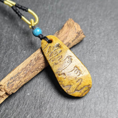 Antique Shield-shaped Kapala Amulet - 46mm - Tibetan Buddhist amulet, close-up detail
