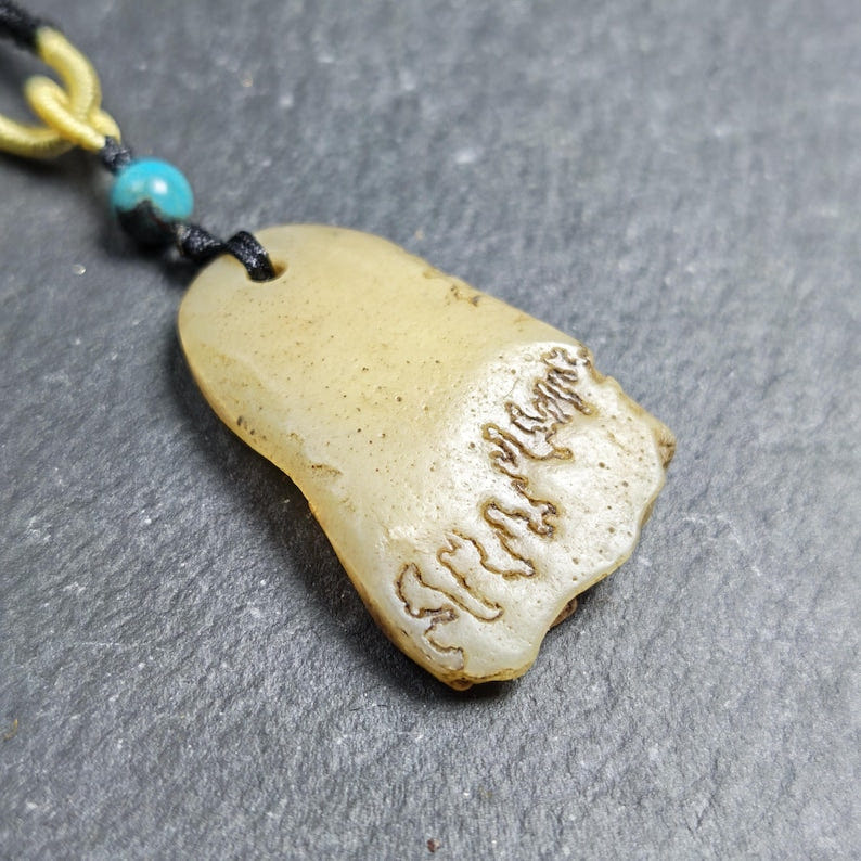 Original Kapala Amulet - 38mm - Tibetan Buddhist amulet, close-up detail