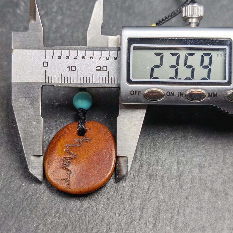 Antique Kapala Amulet - Gandhanra Old Tibetan Protective Charm - 24mm - Decades  - Tibetan Buddhist amulet, size reference