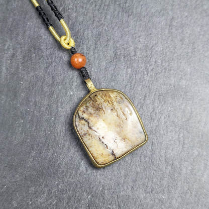 Antique Shield-shaped Kapala Amulet 36mm - Tibetan Buddhist amulet, front view