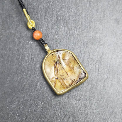 Antique Shield-shaped Kapala Amulet 36mm - Tibetan Buddhist amulet, detailed view