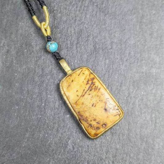 Antique Shield-shaped Kapala Amulet - 40mm - Tibetan Buddhist amulet, front view