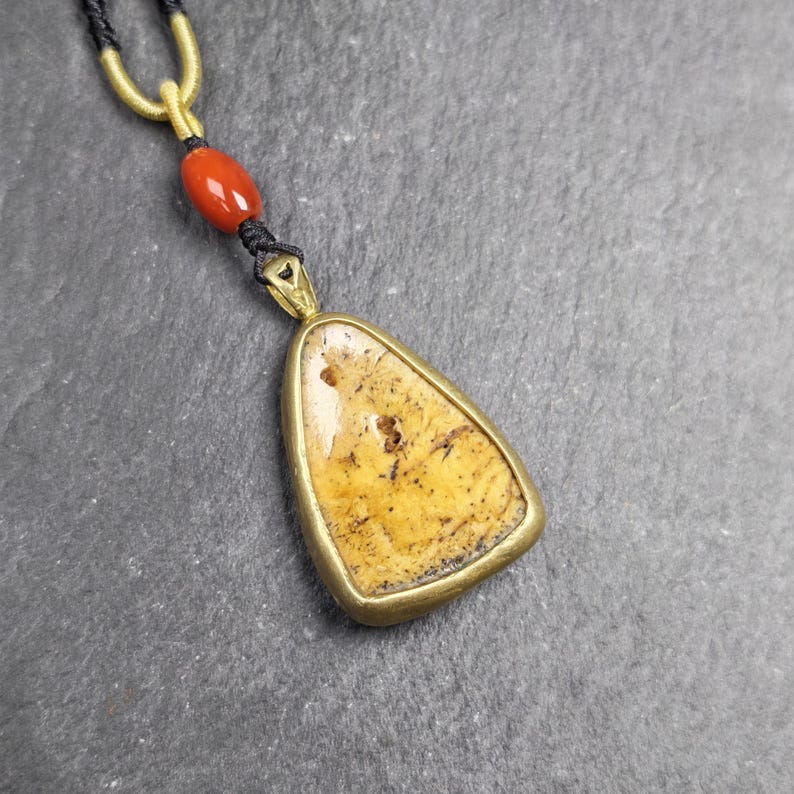 Shield-shaped Kapala Amulet - 37mm - Tibetan Buddhist amulet, detailed view