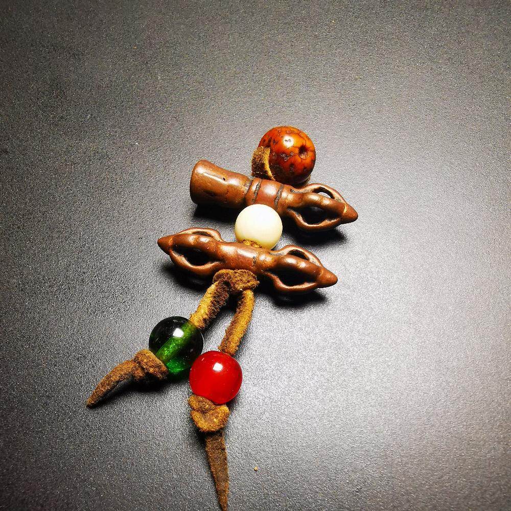 Amulet,Mini Vajra and Tibetan Bell Bead Pendant - Tibetan Buddhist amulet, close-up detail