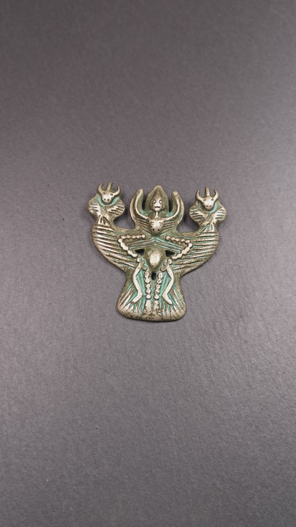 This Garuda is collected from Yaqing Monastery Baiyu County Tibet,it's a handmade badge,amulet pandent, made of copper,about 80 years old.  You can wear it as amulet pendant, or make it into wall decoration, hang on the door as a protector,or just put it on your desk,as an ornament.