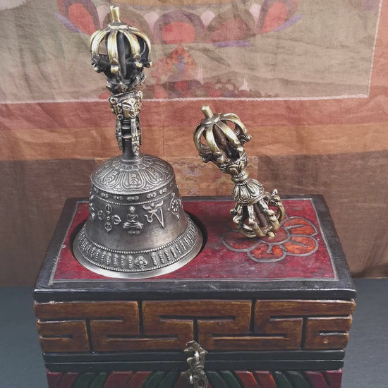 This vajra and bell set was handmade in Nepal,using traditional techniques and materials. The vajra is made of brass, the bell is made of bronze,carved mantra and other trantic buddhism patterns. The outer box is made of wood,carved manadala flower and traditional patterns.