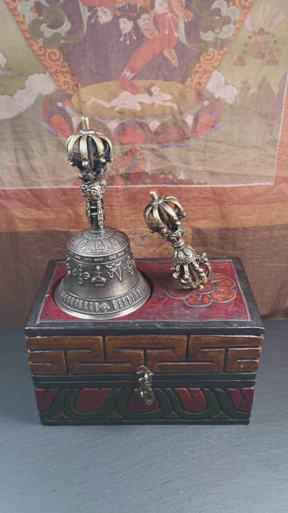 This vajra and bell set was handmade in Nepal,using traditional techniques and materials. The vajra is made of brass, the bell is made of bronze,carved mantra and other trantic buddhism patterns. The outer box is made of wood,carved manadala flower and traditional patterns.