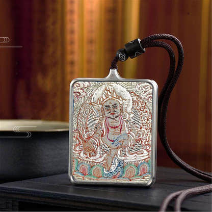 Handpainted Locket Thangka Amulet,White Jambhala,Buddha of Wealth - Tibetan thangka painting, close-up detail