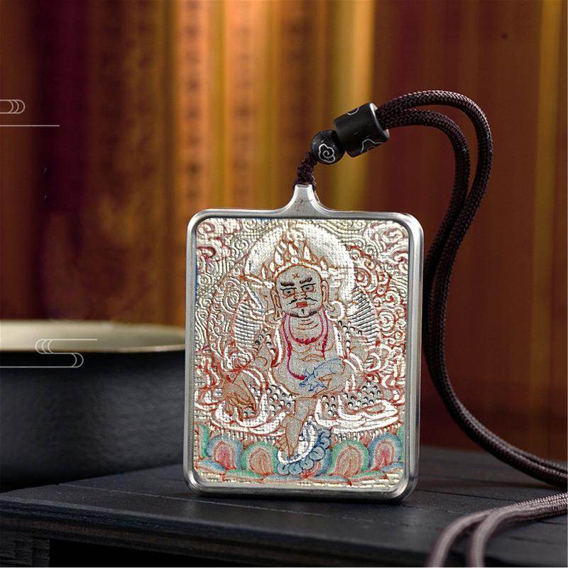 Handpainted Locket Thangka Amulet,White Jambhala,Buddha of Wealth - Tibetan thangka painting, close-up detail