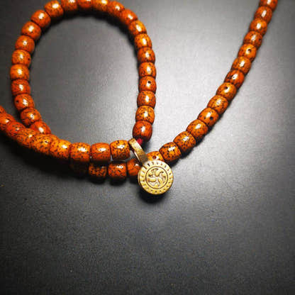 Gandhanra Old Tibetan Buddhist Mala Counter Clip for Prayer Beads,Dharmachakra / - Tibetan Buddhist mala beads, close-up detail