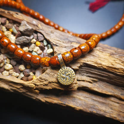 Gandhanra Old Tibetan Buddhist Mala Counter Clip for Prayer Beads,Dharmachakra / - Tibetan Buddhist mala beads, detailed view